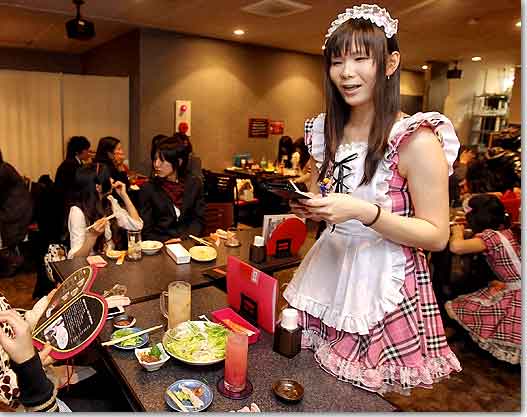 maid taking order in tokyo's maid cafe
