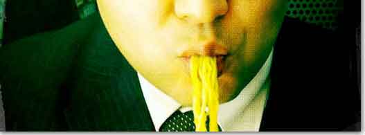 japanese businessman slurping noodles